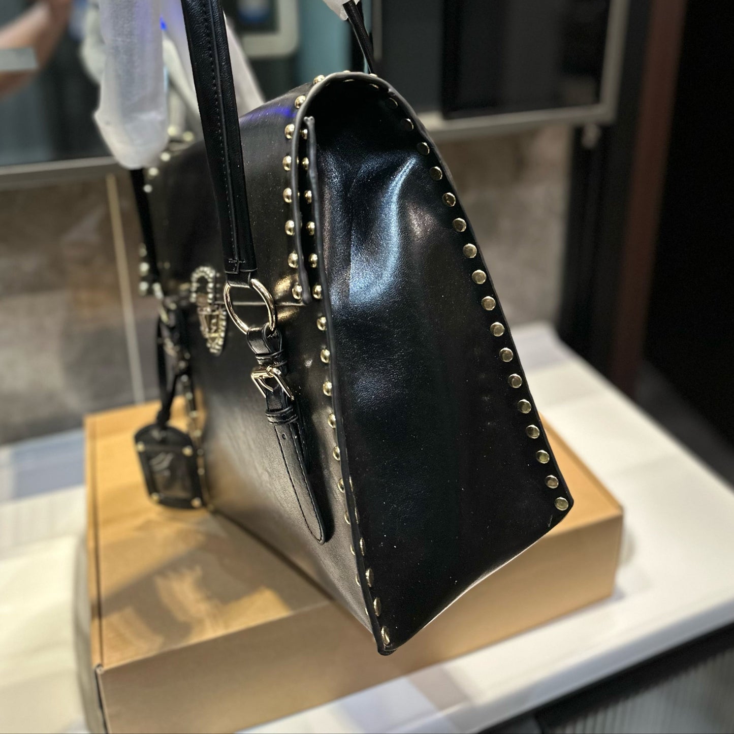 STUDDED TOP HANDLE BAG 33 IN BLACK SMOOTH CALFSKIN