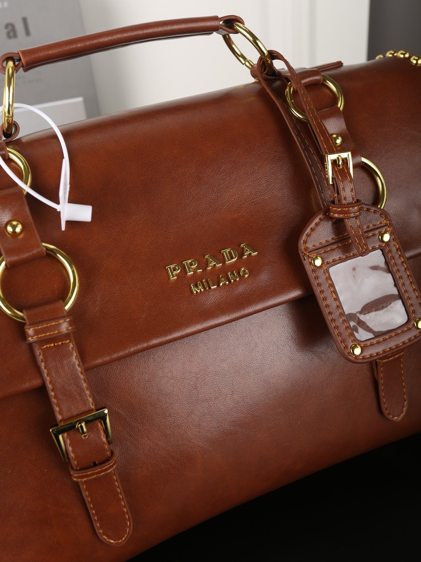 STUDDED BRIEFCASE 34 IN BROWN SHINY SMOOTH CALFSKIN