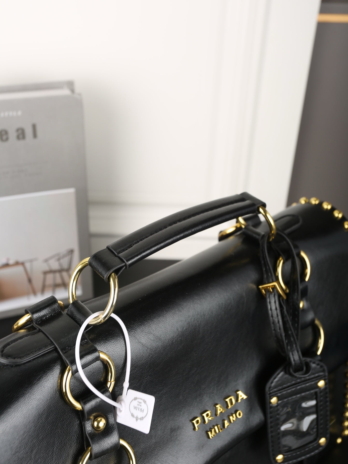 STUDDED BRIEFCASE 34 IN BLACK SHINY SMOOTH CALFSKIN