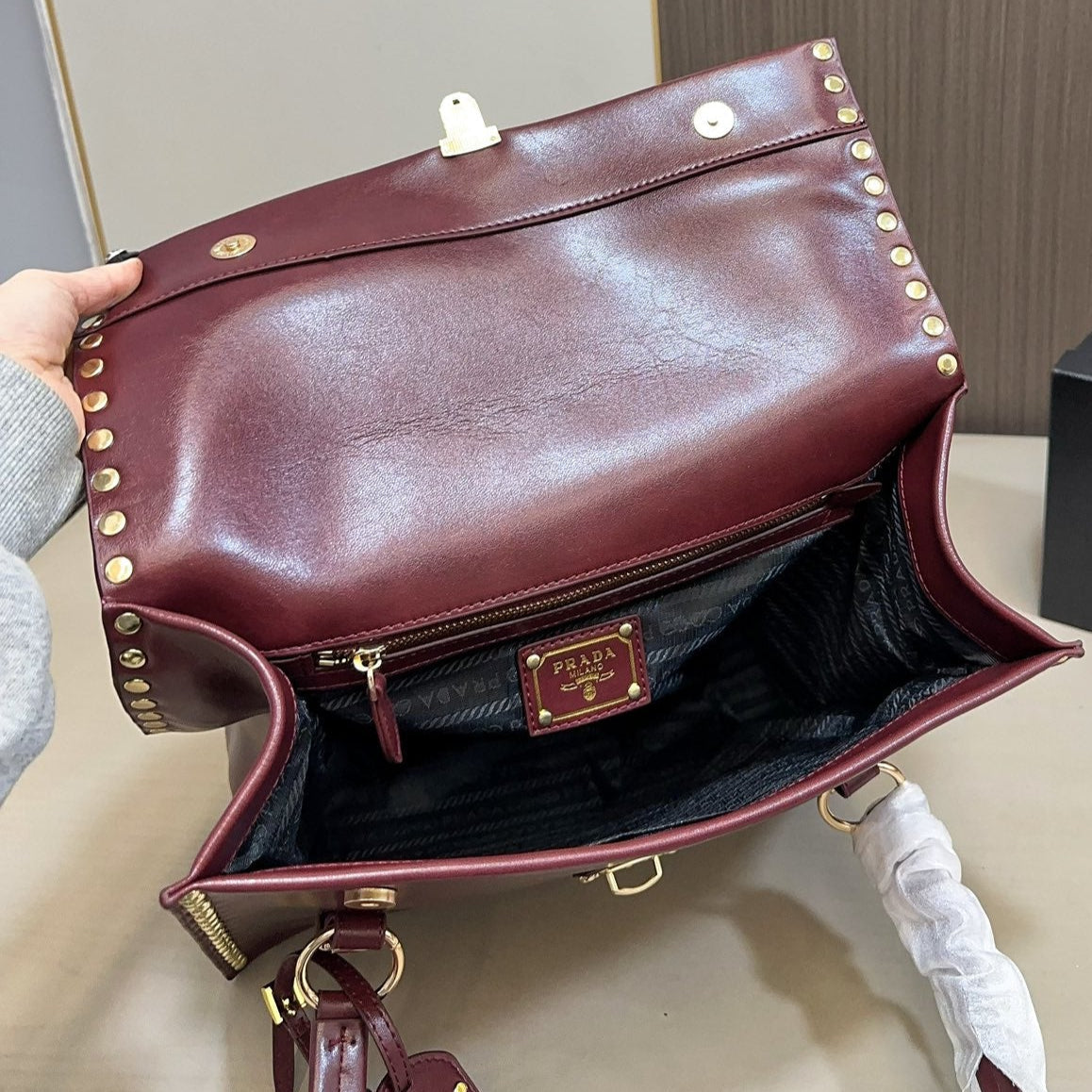 STUDDED TOP HANDLE BAG 33 IN BURGUNDY RED SMOOTH CALFSKIN