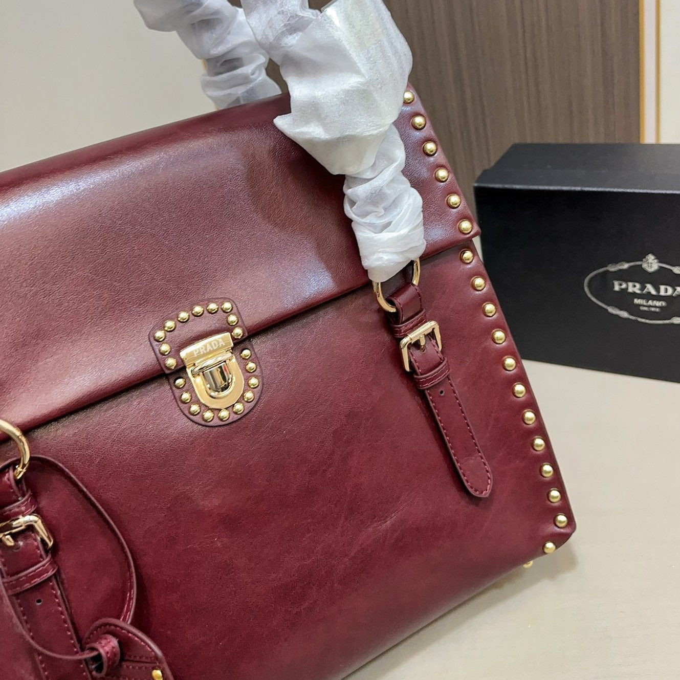 STUDDED TOP HANDLE BAG 33 IN BURGUNDY RED SMOOTH CALFSKIN