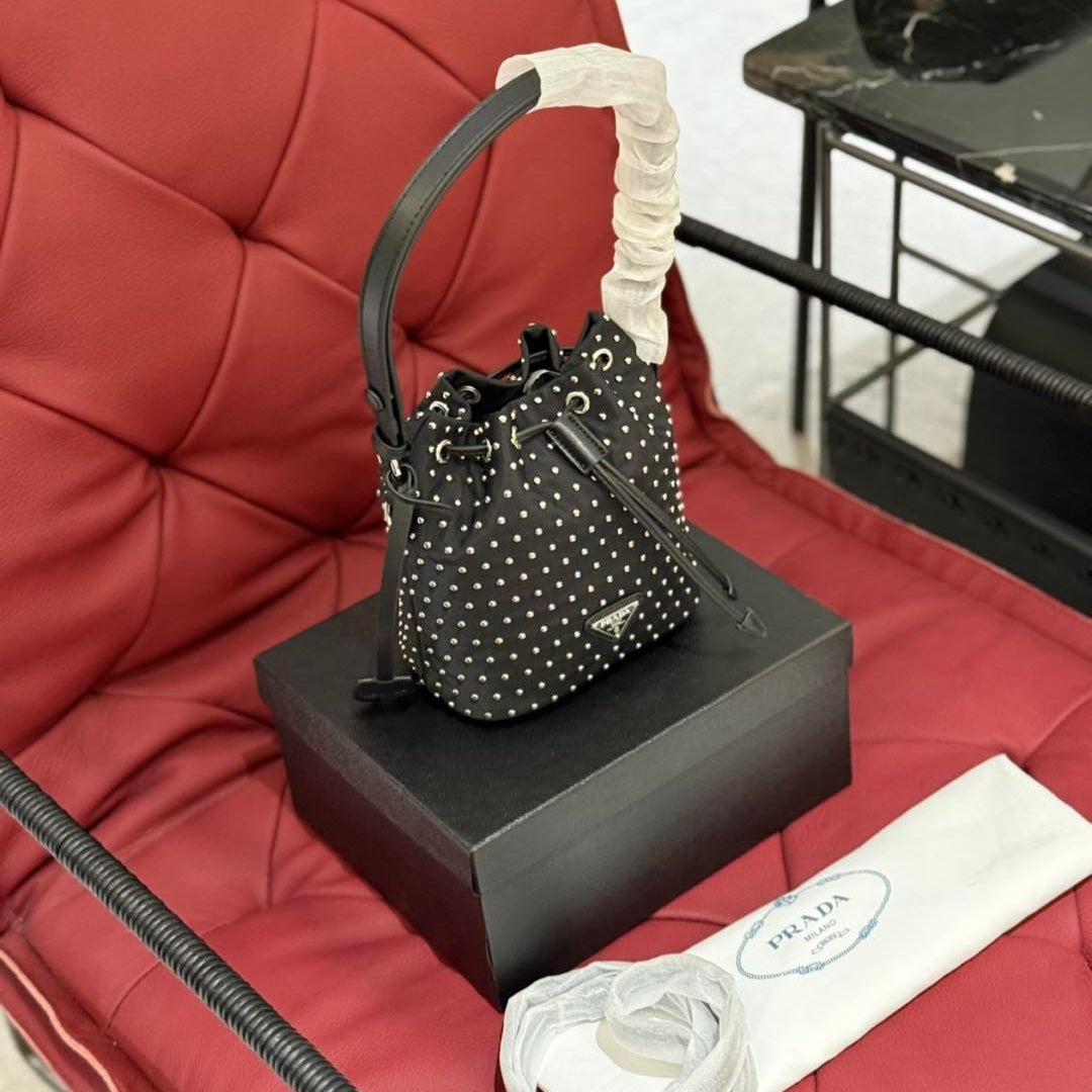 STUDDED DRAWSTRING BUCKET BAG 20 IN BLACK RE-NYLON MIX CALFSKIN