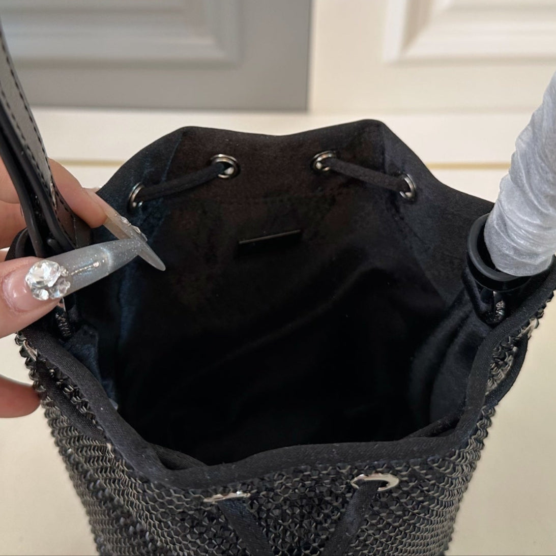 STUDDED BUCKET BAG 19 IN BLACK RE-NYLON MIX CALFSKIN