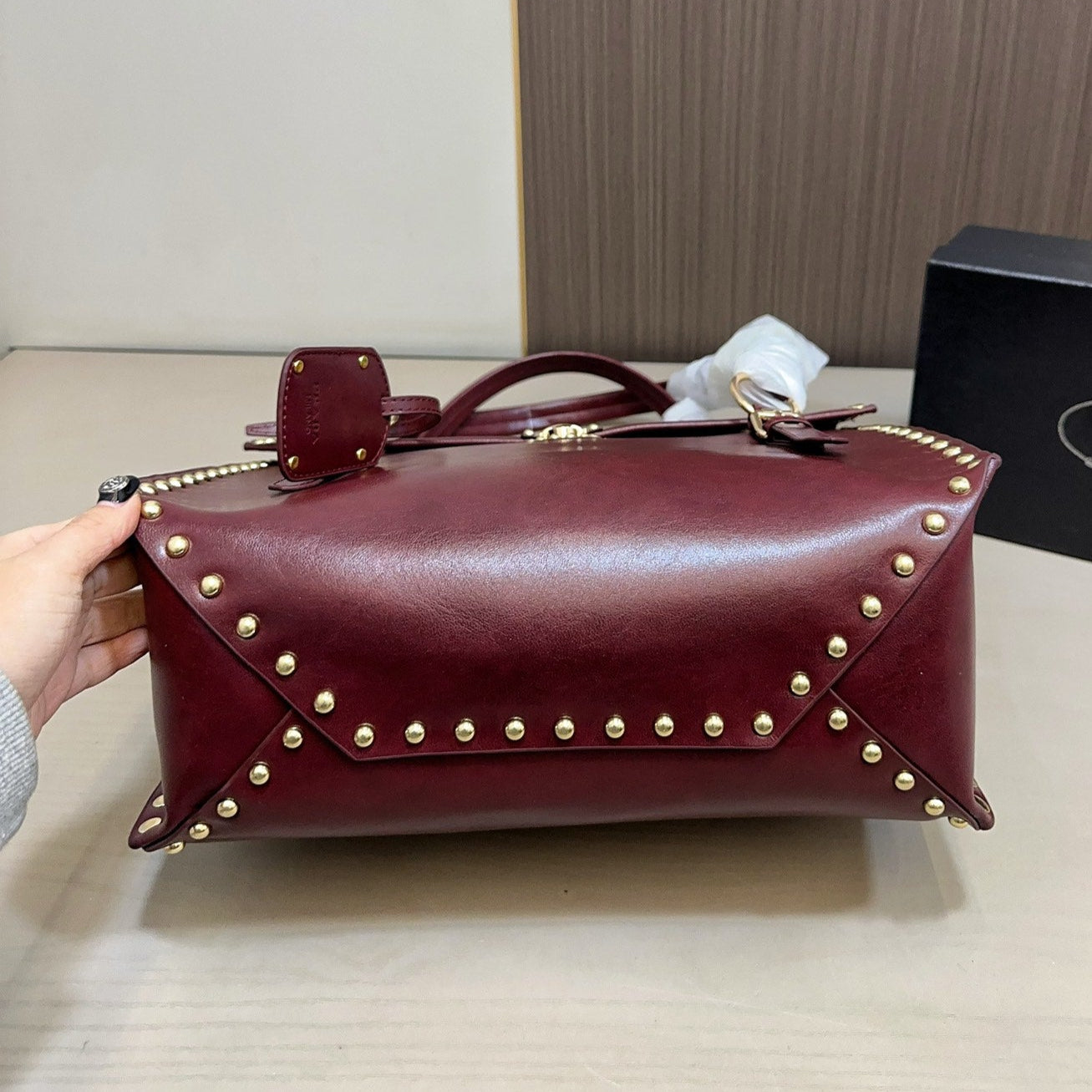 STUDDED TOP HANDLE BAG 33 IN BURGUNDY RED SMOOTH CALFSKIN