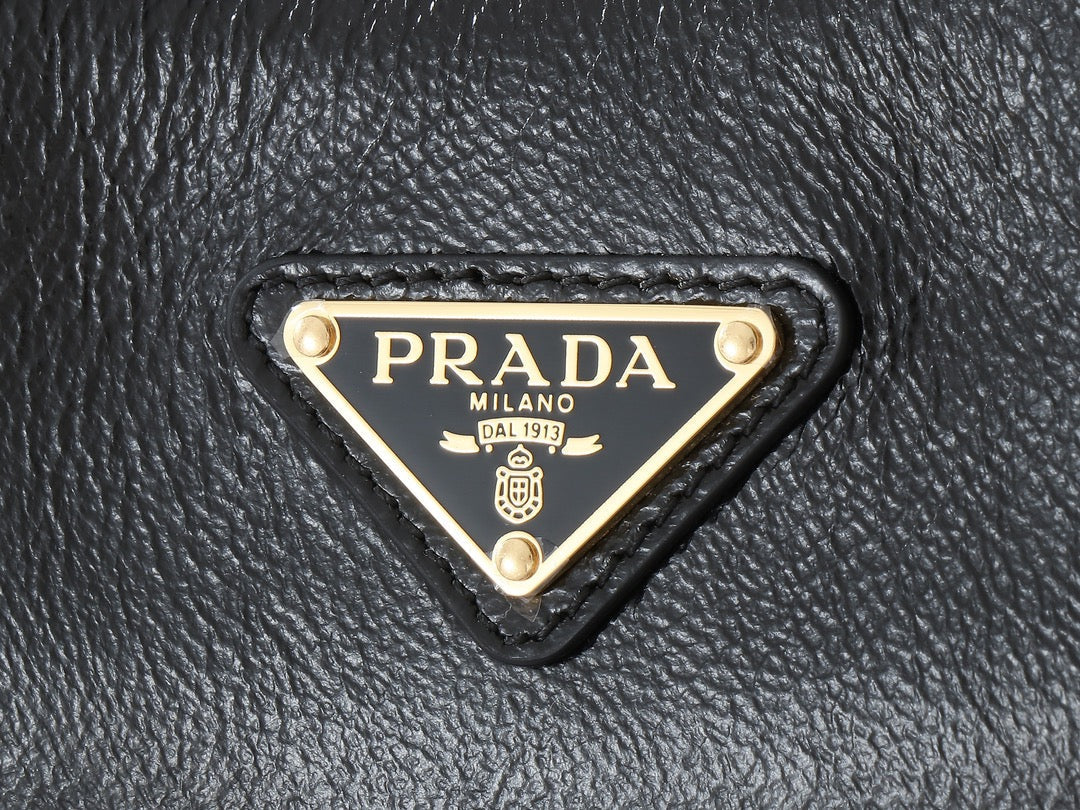 TRIANGLE LOGO HOBO BAG 39 IN BLACK SMOOTH CALFSKIN