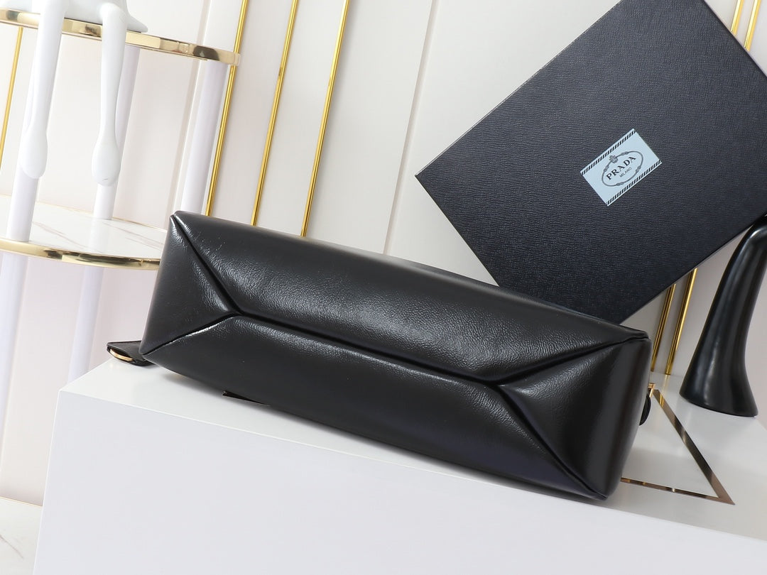 TRIANGLE LOGO HOBO BAG 39 IN BLACK SMOOTH CALFSKIN
