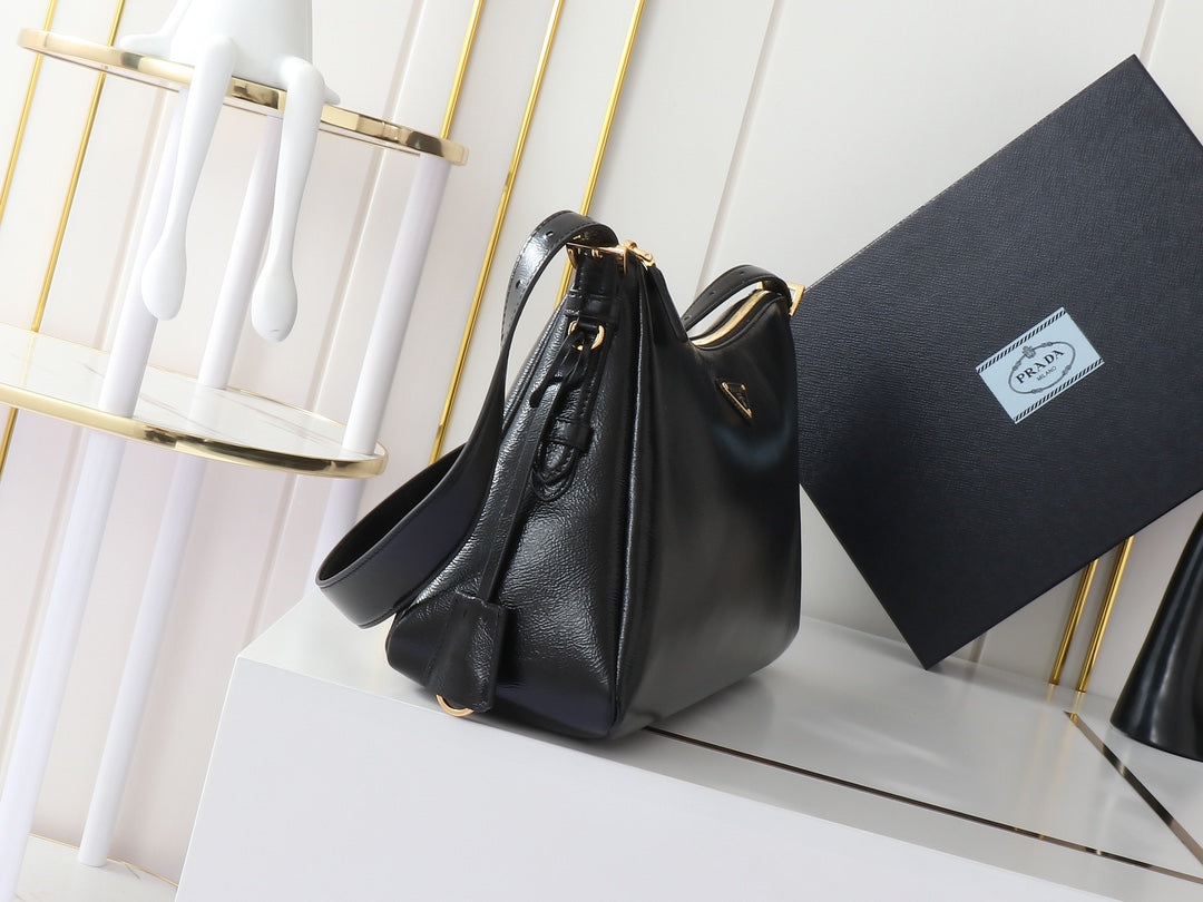 TRIANGLE LOGO HOBO BAG 39 IN BLACK SMOOTH CALFSKIN