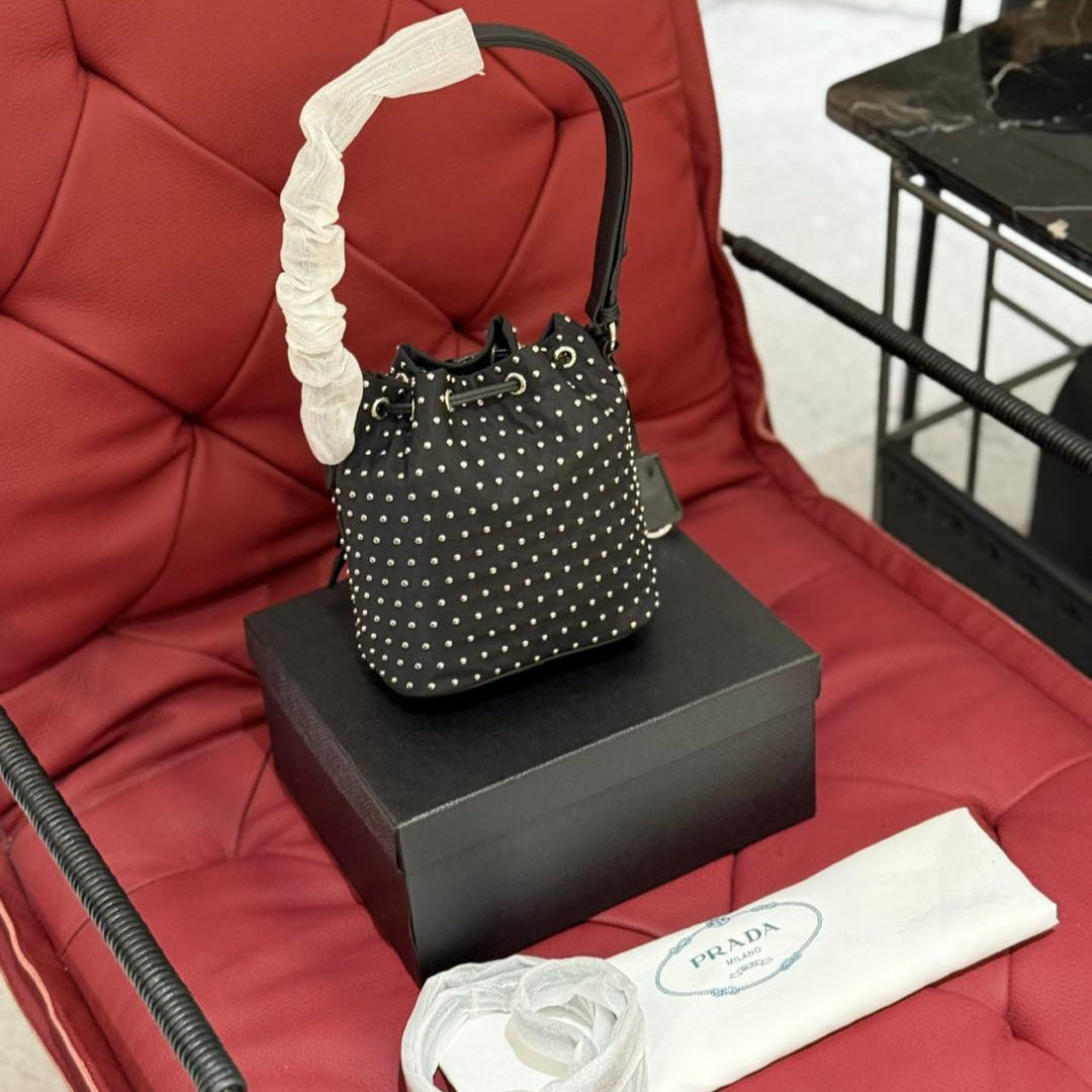 STUDDED DRAWSTRING BUCKET BAG 20 IN BLACK RE-NYLON MIX CALFSKIN