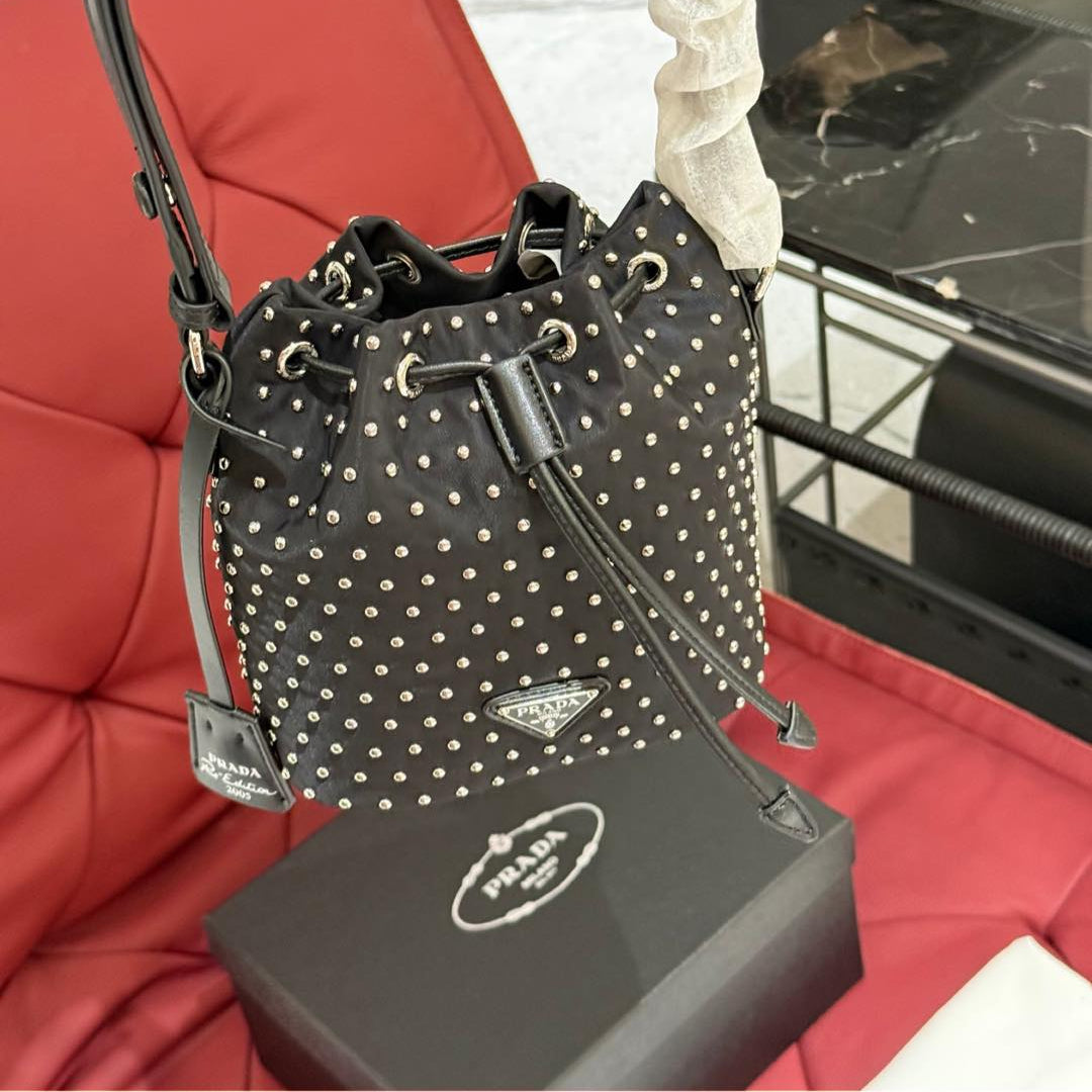 STUDDED DRAWSTRING BUCKET BAG 20 IN BLACK RE-NYLON MIX CALFSKIN