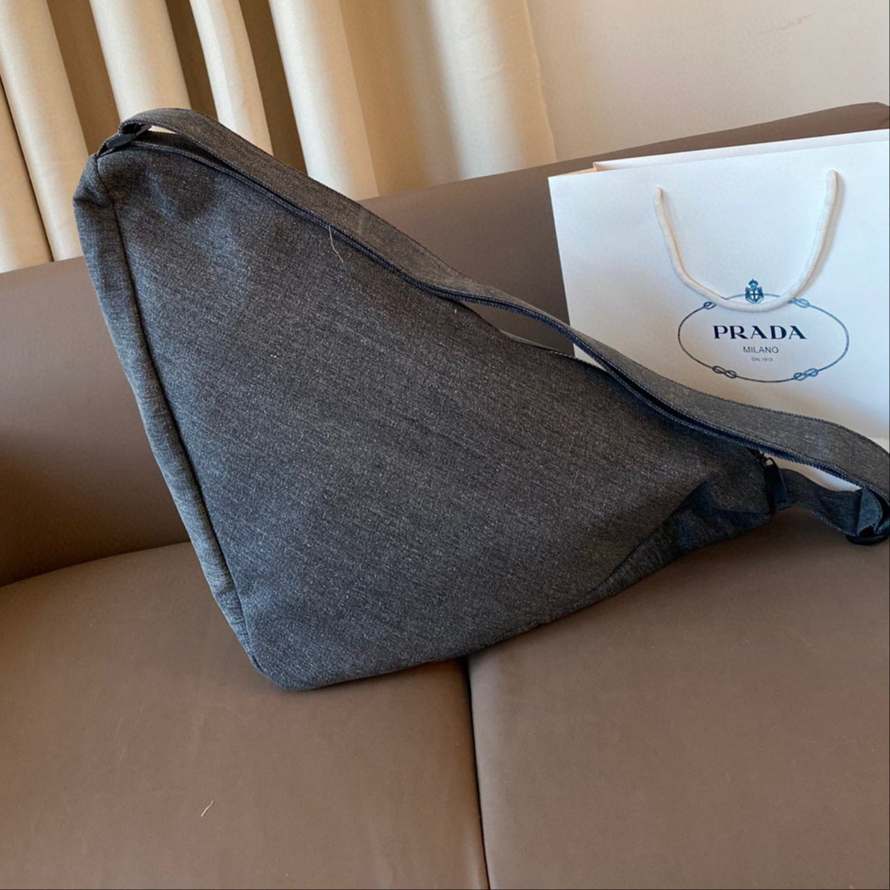 TRIANGLE 55 SHOULDER BAG IN GREY RE-NYLON EMBOSSED LOGO